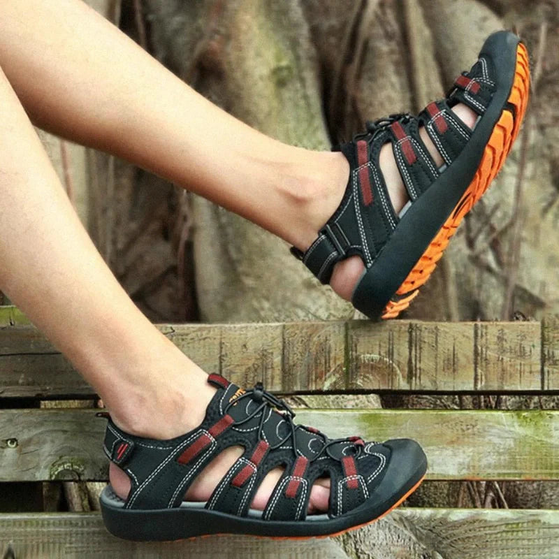 Equipaje Montaña - Sandalias de trekking para hombre negro y naranja
